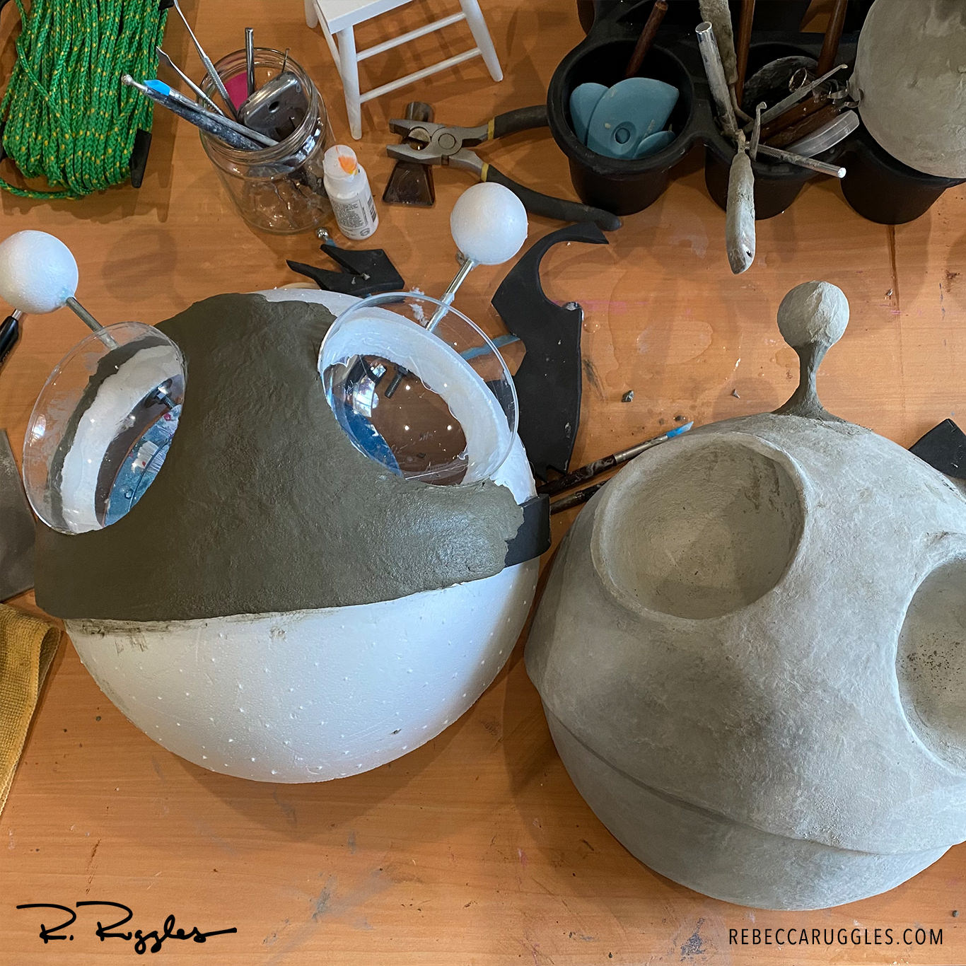 Second the third alien heads being working on by artist and sculptor Rebecca Ruggles.