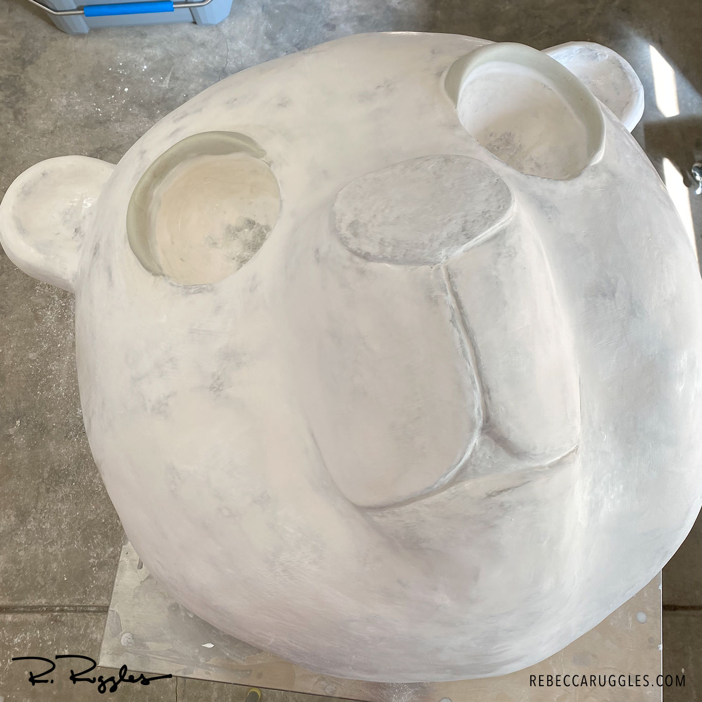Eyelids added to the panda head sculpture with magic sculpt epoxy clay.